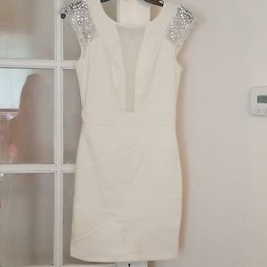 Cocktail dress with sheer chest and rhinestones